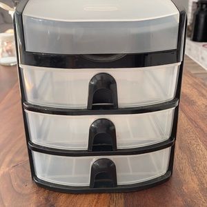 Rubbermaid small organizer. 3 small drawers top flips open.